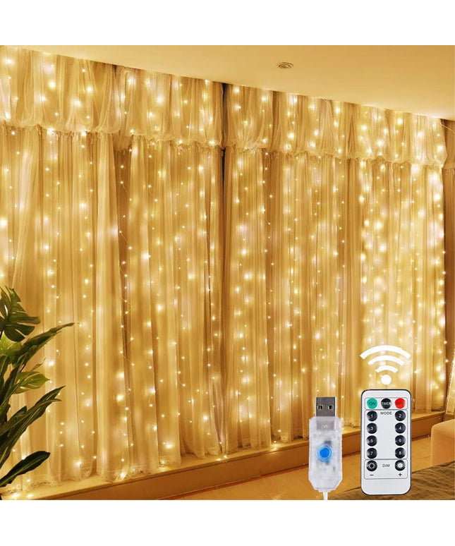 Decorative string lights on a curtain with remote control in front