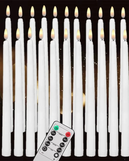 Set of white LED candles with a remote control on a dark background