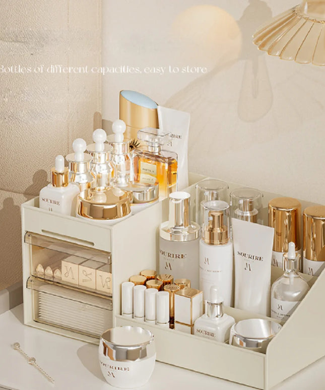 Cosmetic organiser on a desktop with a lamp and wall in background 